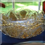 K04. Glass and gold bowls. 